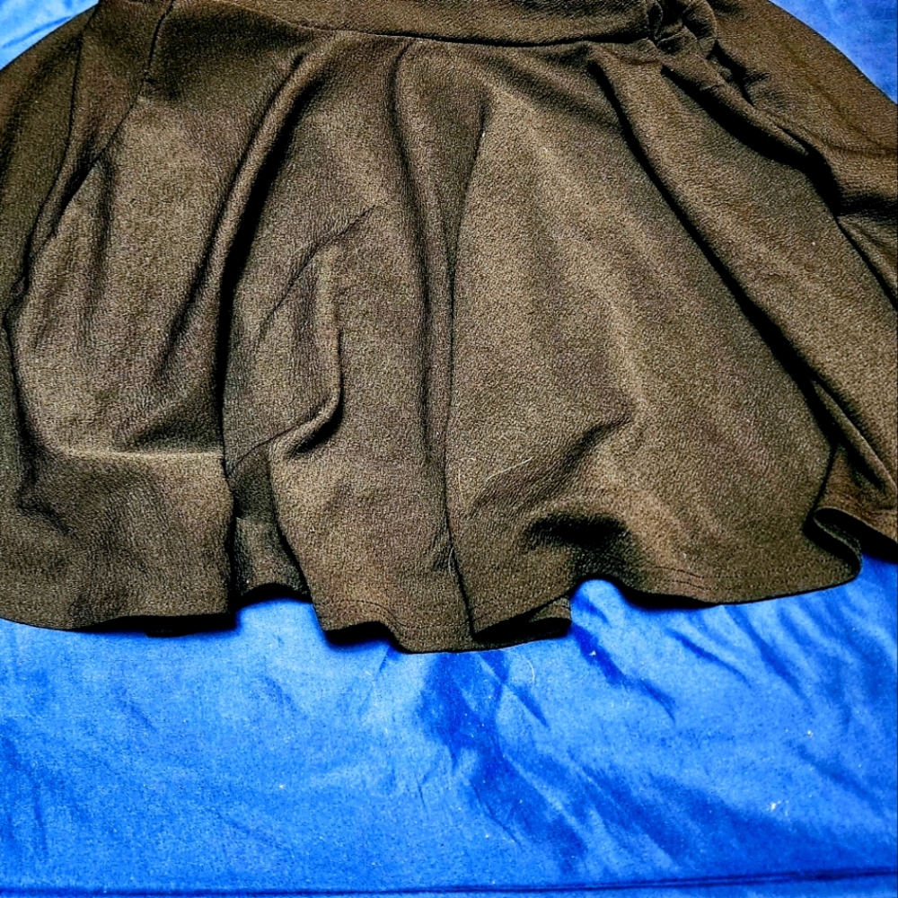 Black ruffle skirt.